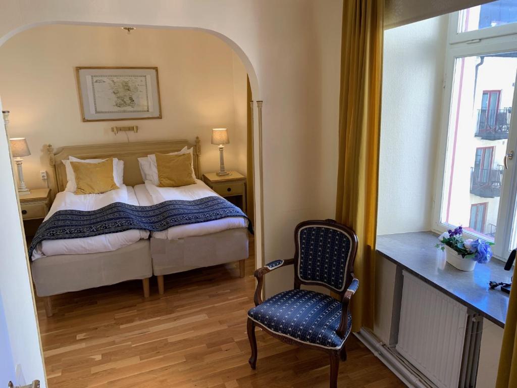 Postel nebo postele na pokoji v ubytování Mayfair Hotel Tunneln