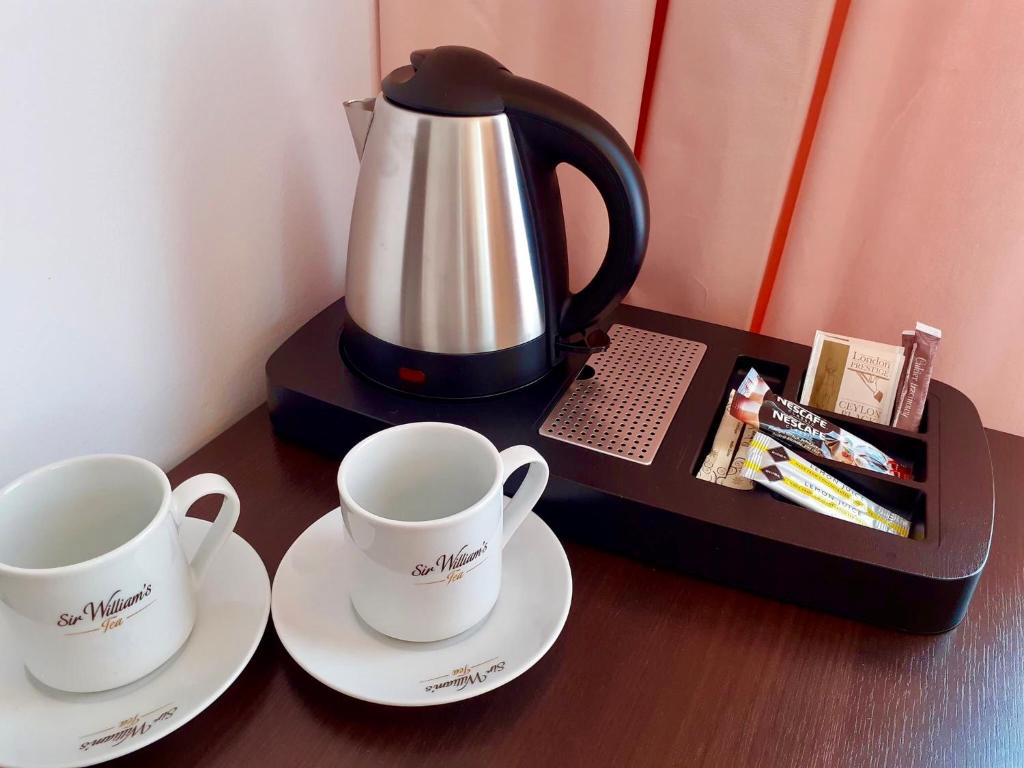 Принадлежности для чая и кофе в Hotel Olecki