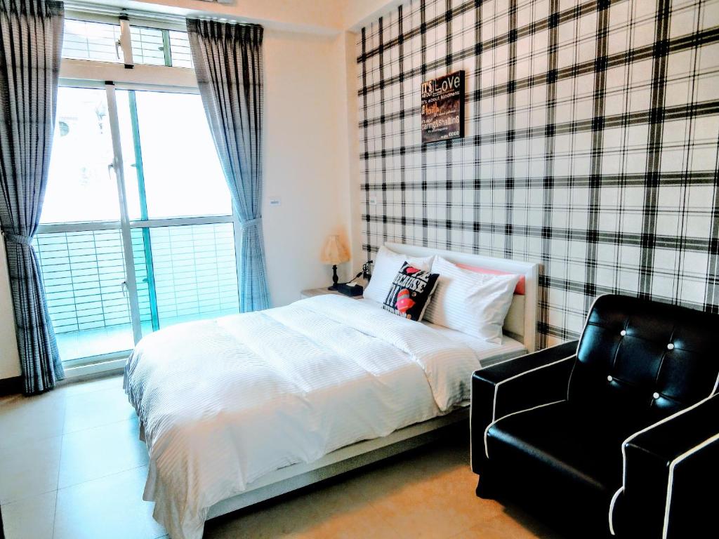 Postel nebo postele na pokoji v ubytování Ruisui Style B&B