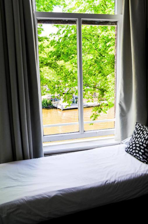 Postel nebo postele na pokoji v ubytování Family Hotel Kooyk