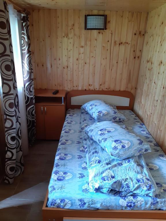 Postel nebo postele na pokoji v ubytování Pastravaria Romani