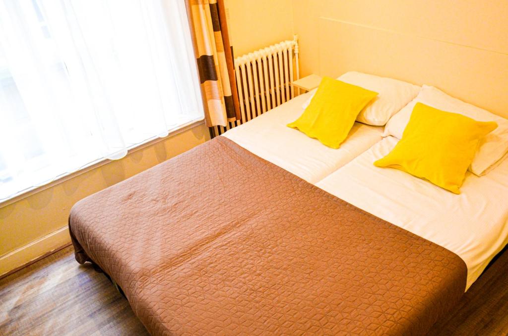 Postel nebo postele na pokoji v ubytování Family Hotel Kooyk