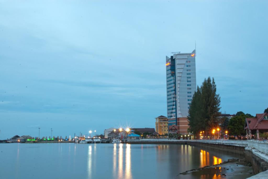 a view of a river with a tall building at Felda Residence Kuala Terengganu in Kuala Terengganu