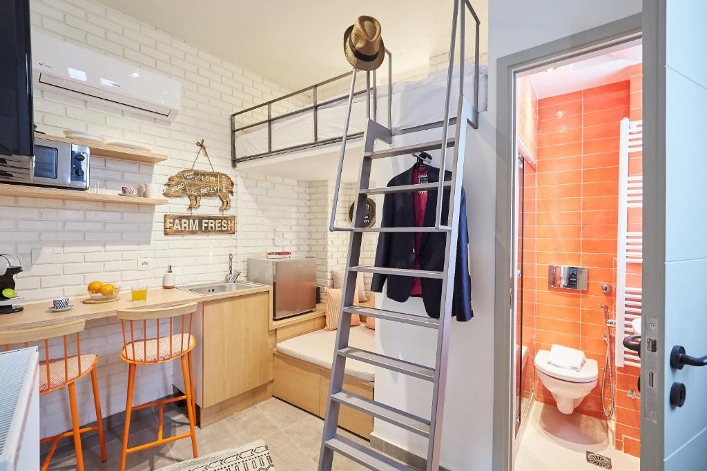 Kuchyňa alebo kuchynka v ubytovaní Mind-blowing petite studio in the heart of Athens!