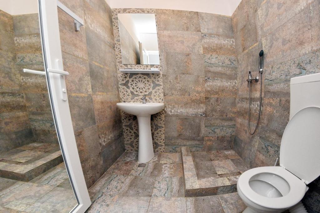 Koupelna v ubytování Hotel Mercur