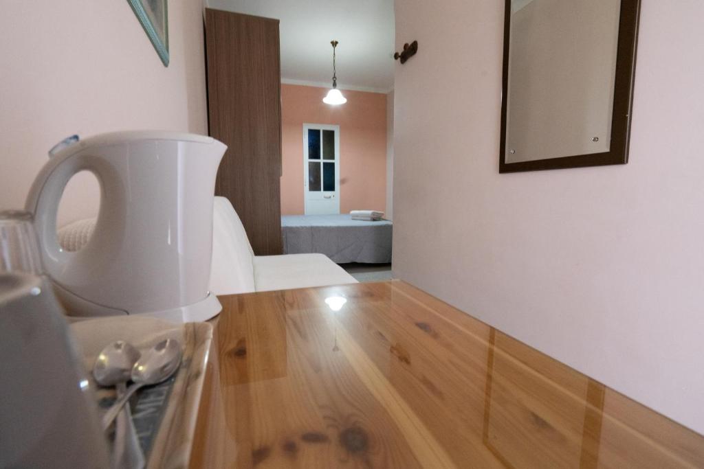 a kitchen with a white mixer on a counter at Lantern Guest House in Marsalforn