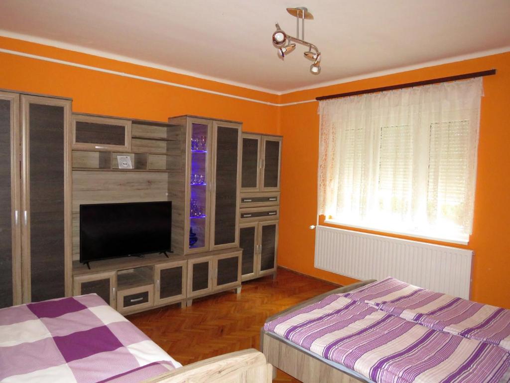 Postel nebo postele na pokoji v ubytování Székely Apartman