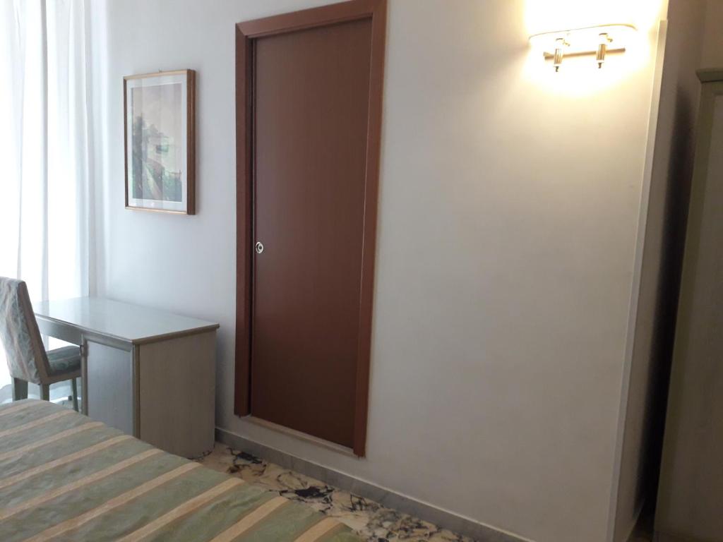 Łóżko lub łóżka w pokoju w obiekcie Gioia Guest House
