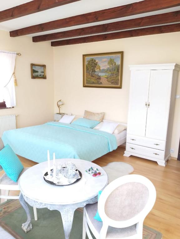 Postel nebo postele na pokoji v ubytování Cafe Duo