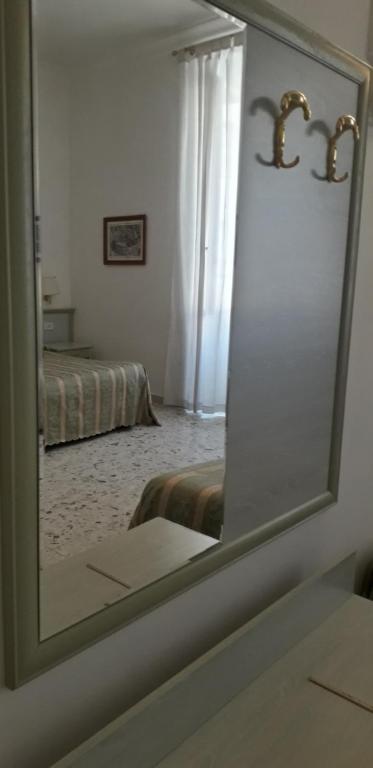 Łóżko lub łóżka w pokoju w obiekcie Gioia Guest House