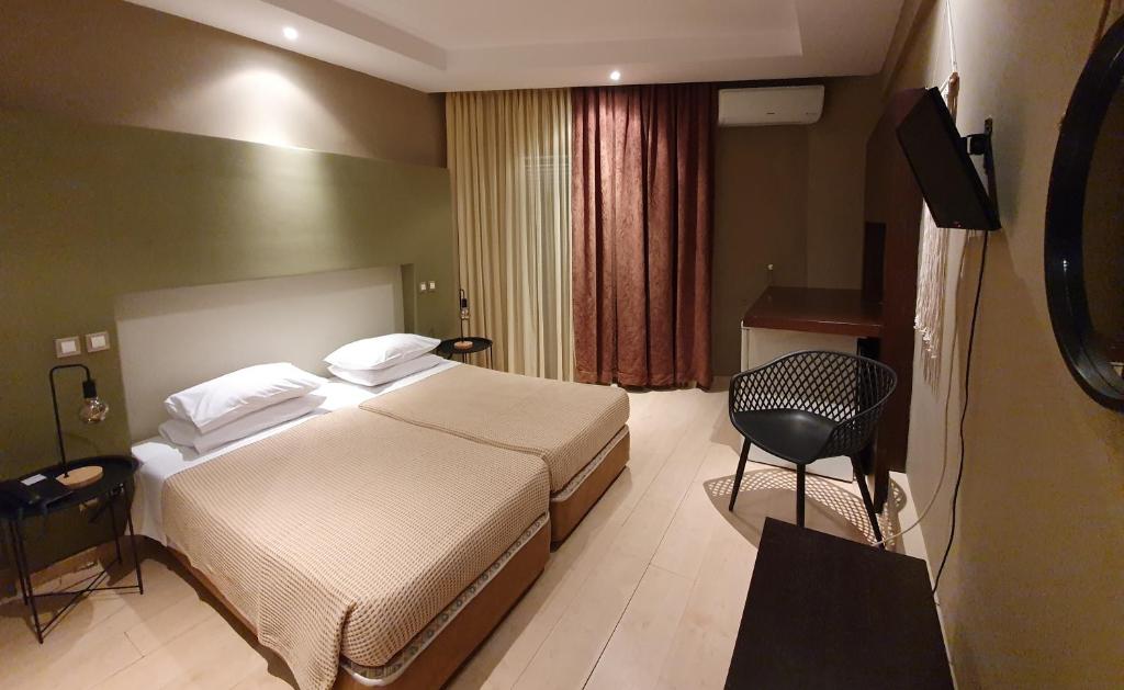 Postel nebo postele na pokoji v ubytování Hotel Aphroditi Island Park