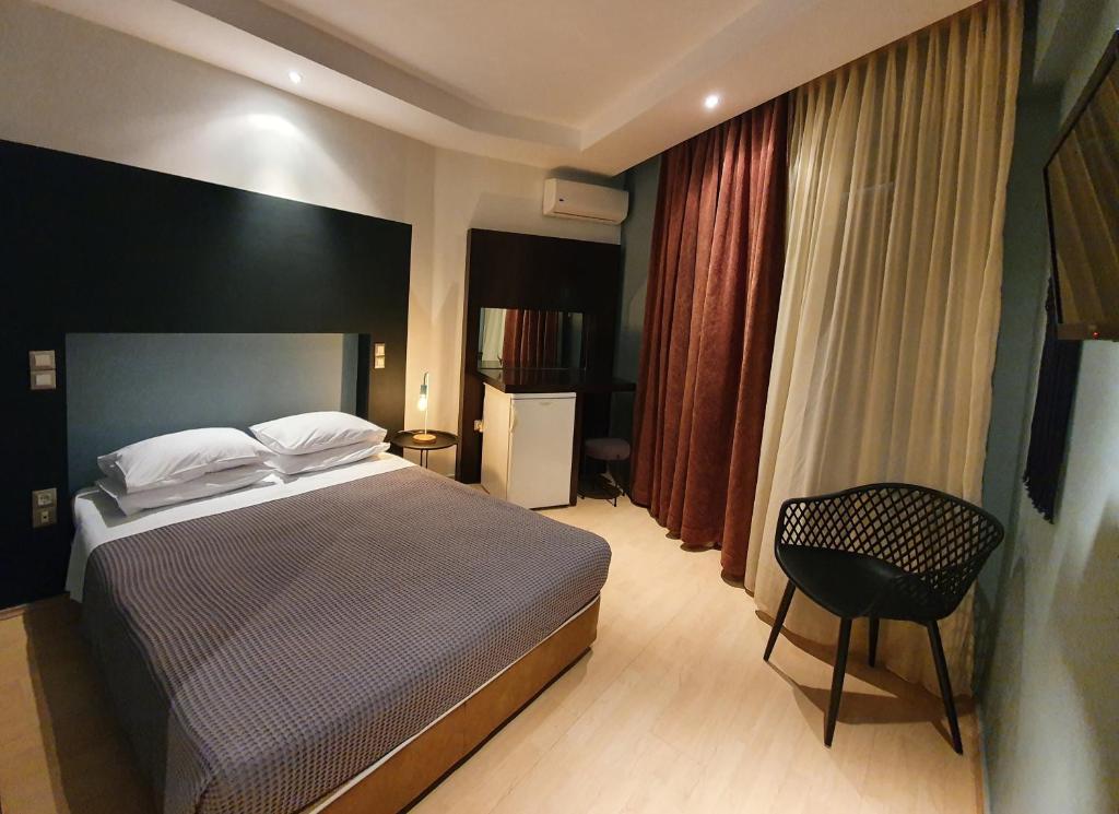 Postel nebo postele na pokoji v ubytování Hotel Aphroditi Island Park