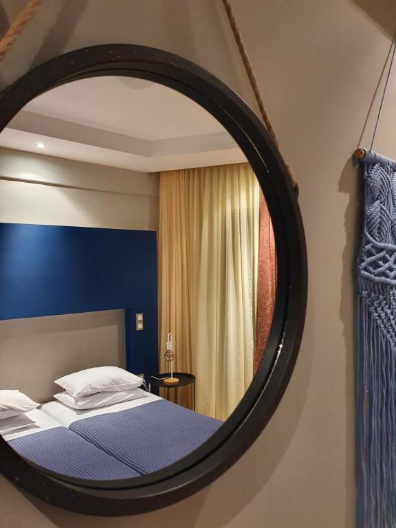 Postel nebo postele na pokoji v ubytování Hotel Aphroditi Island Park