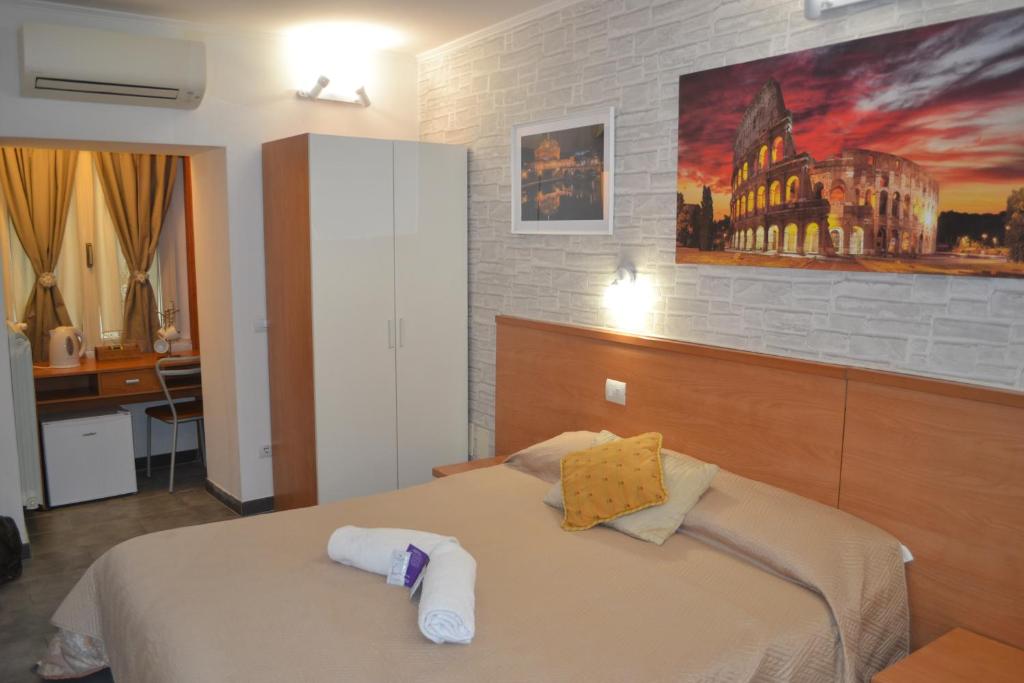 Postel nebo postele na pokoji v ubytování A&F Colosseo
