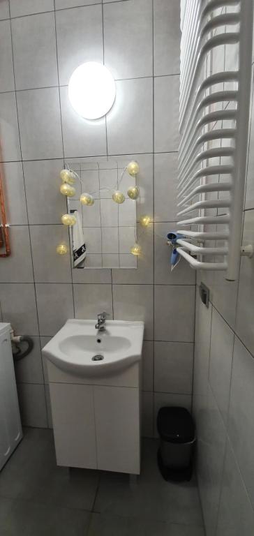 Kúpeľňa v ubytovaní Apartament Orchidea
