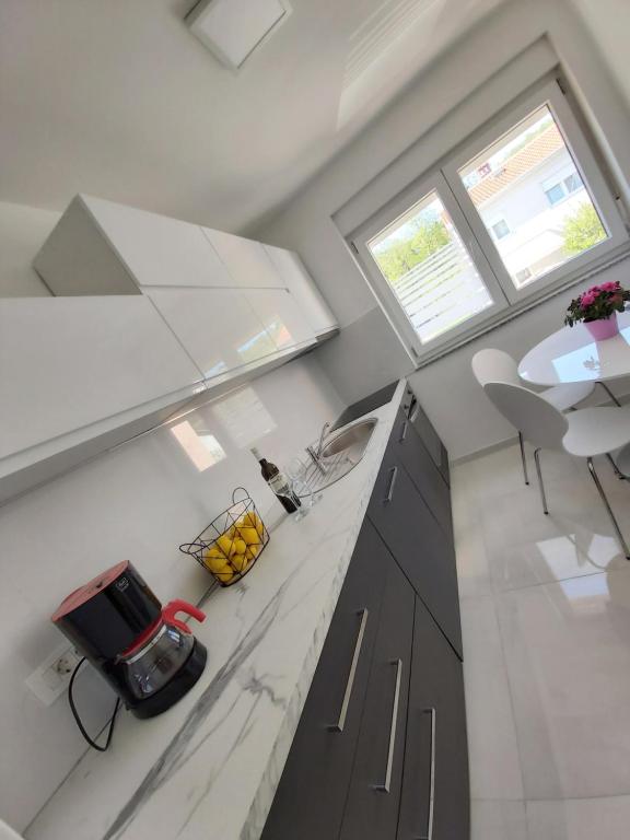 Kuchnia lub aneks kuchenny w obiekcie Comfortable apartment near Opatija