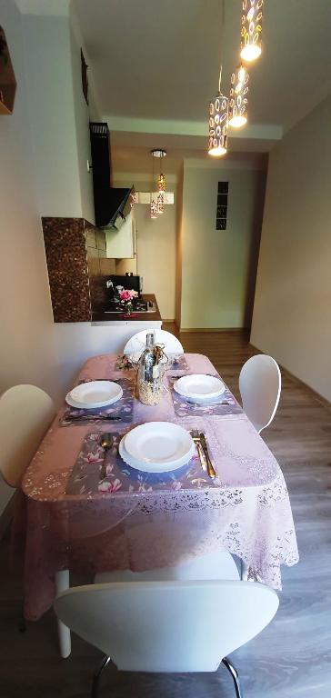 Posedenie v ubytovaní Apartament Orchidea
