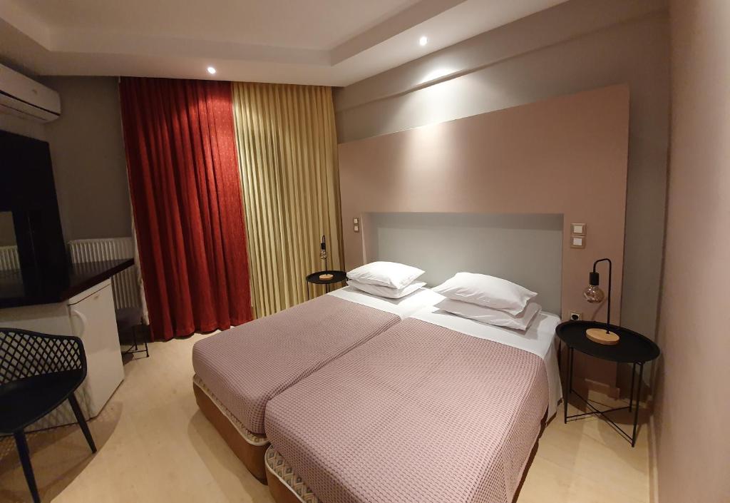 Postel nebo postele na pokoji v ubytování Hotel Aphroditi Island Park