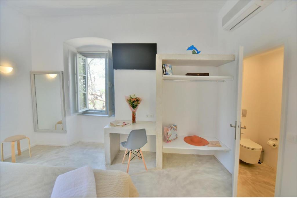 TV a/nebo společenská místnost v ubytování Loukia's Apartments