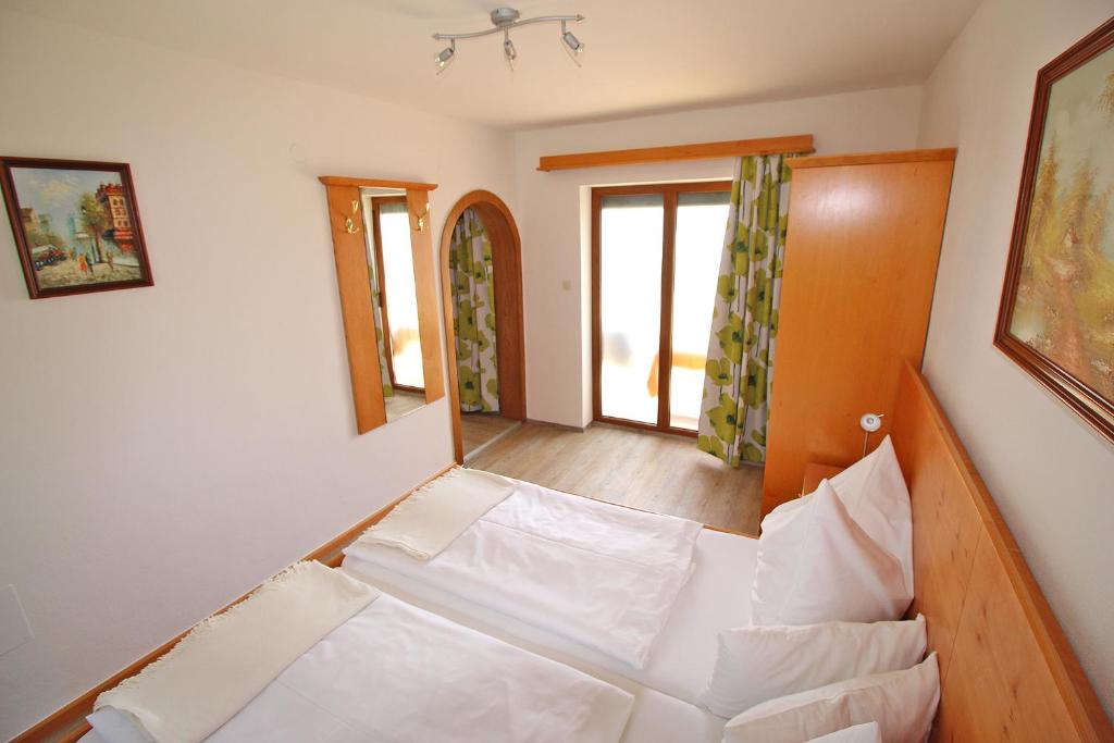 Postel nebo postele na pokoji v ubytování Haus Falle