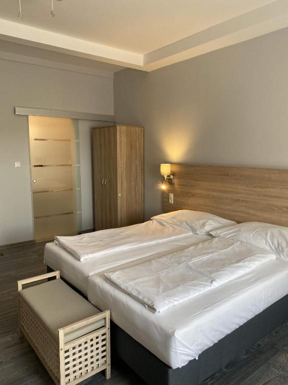 Postel nebo postele na pokoji v ubytování Kis Szieszta panzió