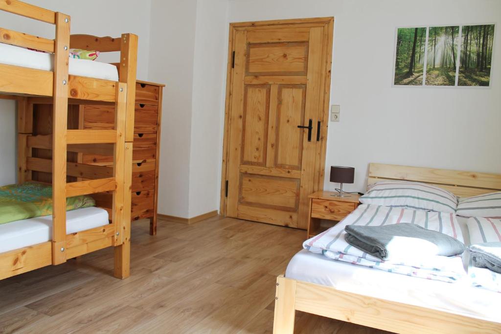 Postel nebo postele na pokoji v ubytování Ferienhaus Anni