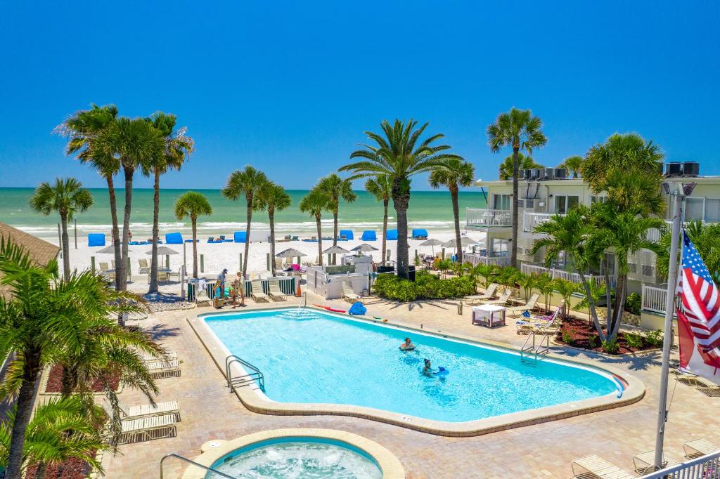 an aerial view of the pool and beach at the resort at Grand Shores West in St Pete Beach