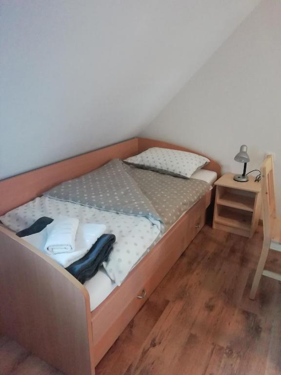 Postel nebo postele na pokoji v ubytování ODAI