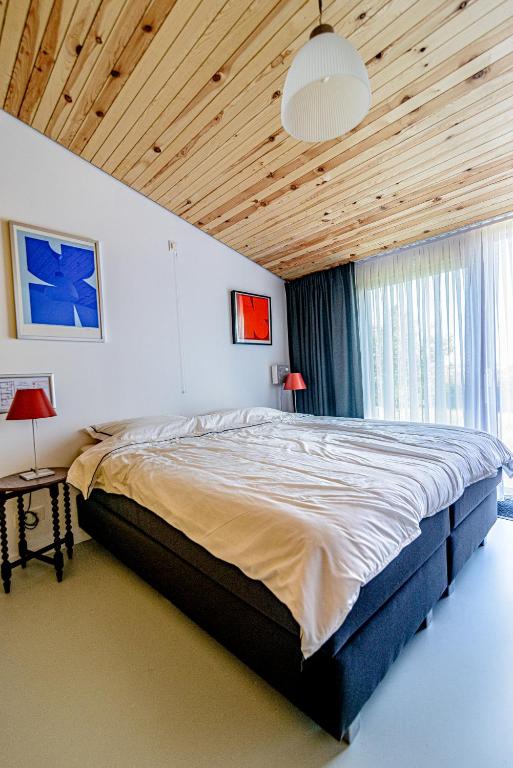 Postel nebo postele na pokoji v ubytování Domein De Kleine Mote