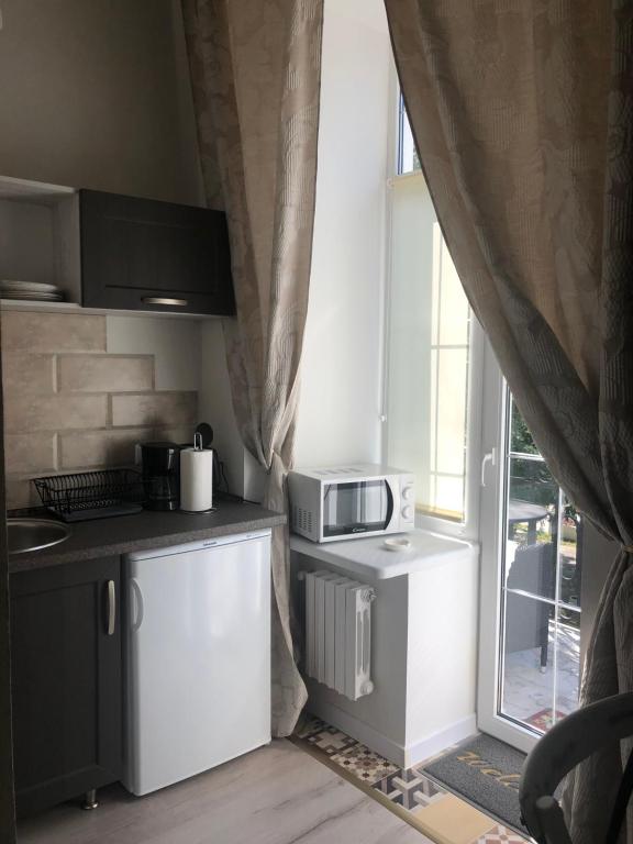 The GardenApartments - Deluxe Double Room с балконом