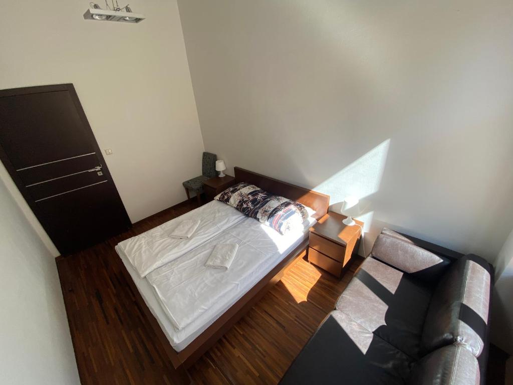Postel nebo postele na pokoji v ubytování P&J Apartments Floriańska