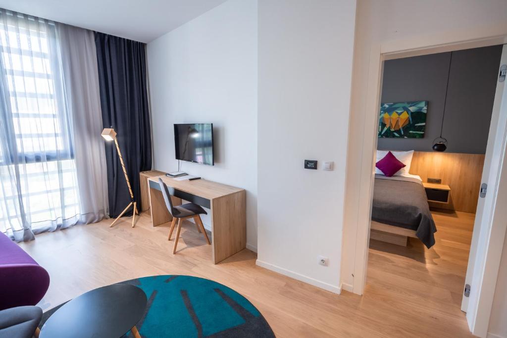 Posteľ alebo postele v izbe v ubytovaní Hotel Academia