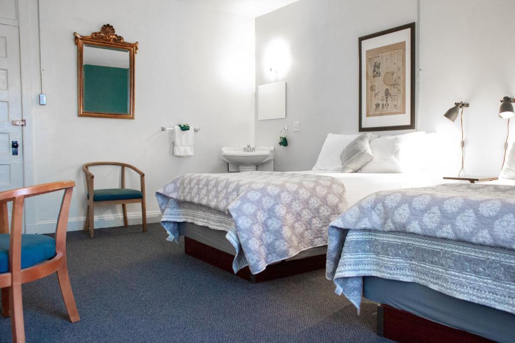 Postel nebo postele na pokoji v ubytování 11th Avenue Hostel