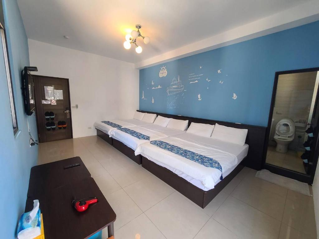 Postel nebo postele na pokoji v ubytování New Summer Homestay