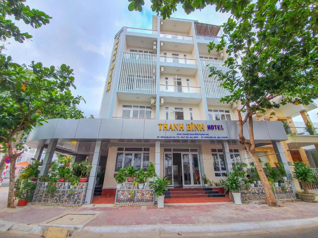 a building with a sign that reads thankianeeus hotel at Thanh Binh Hotel Con Dao in Con Dao