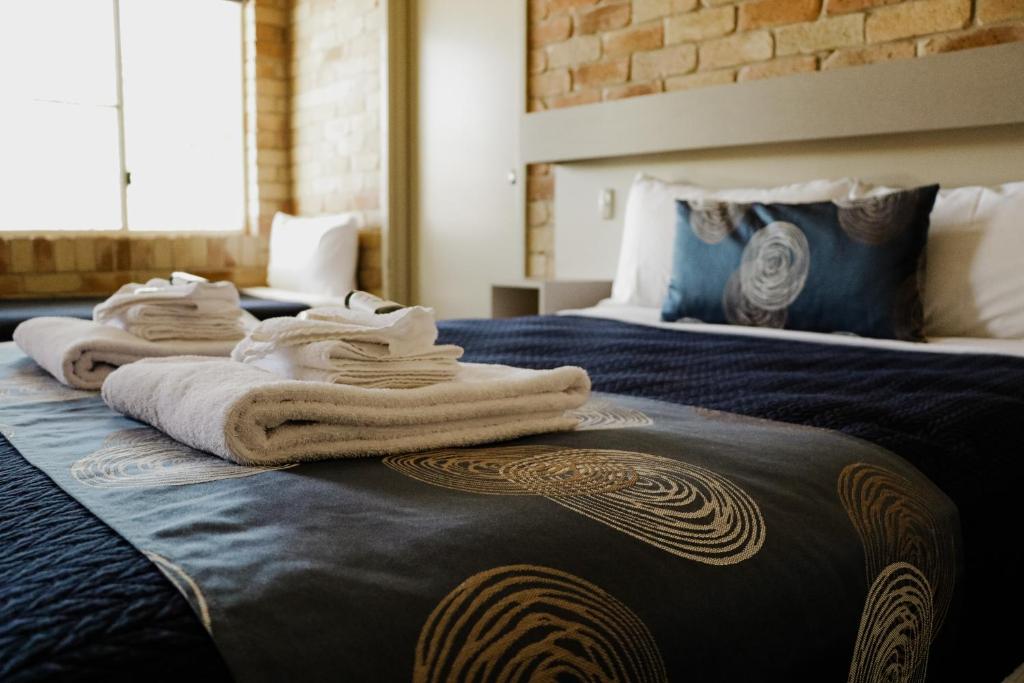 Ліжко або ліжка в номері The Australian Hotel St George