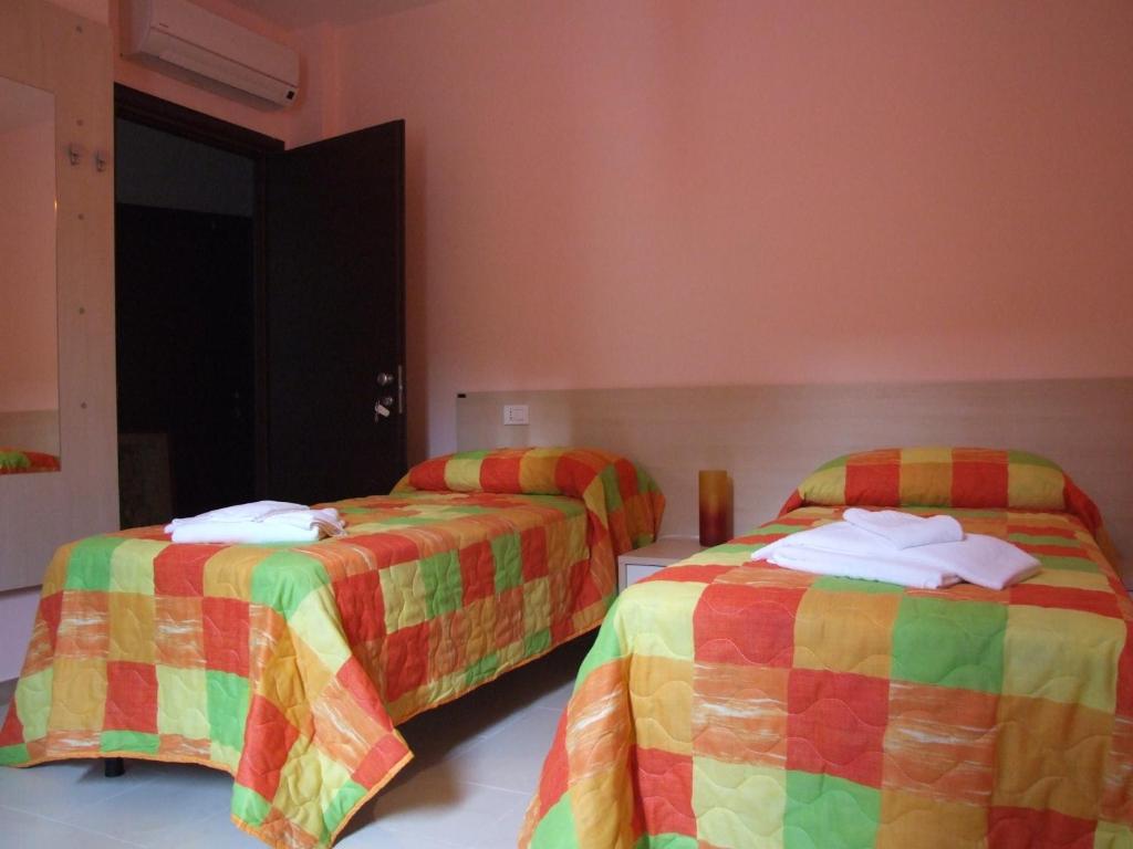 Postel nebo postele na pokoji v ubytování B&B Angolo Felice