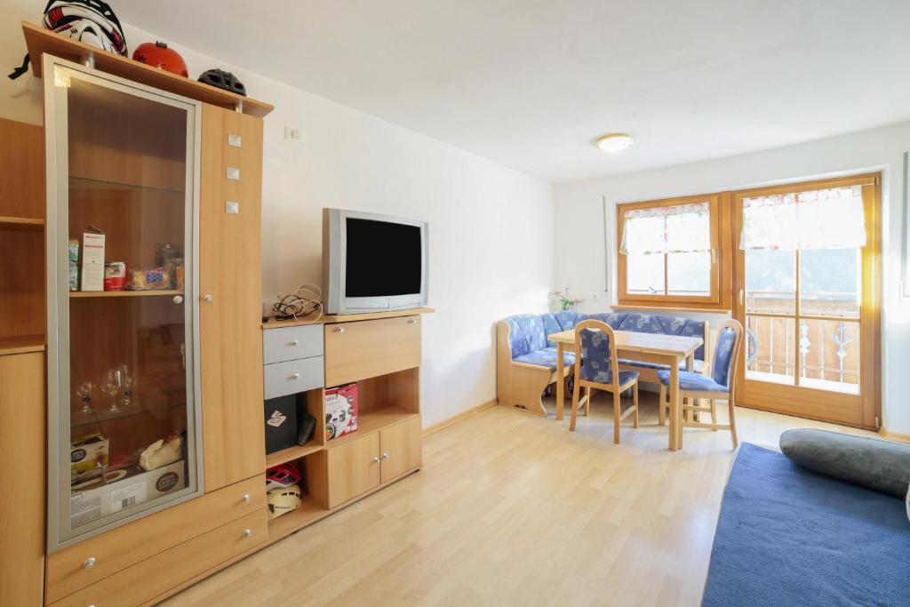 TV a/nebo společenská místnost v ubytování Strickerhof - Appartment 3