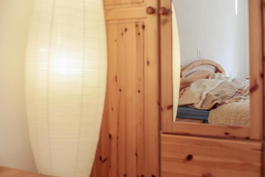 Postel nebo postele na pokoji v ubytování Strickerhof - Appartment 3