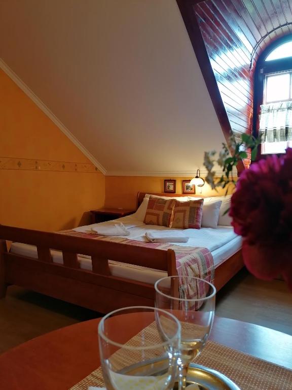 Postel nebo postele na pokoji v ubytování Forrás Fogadó