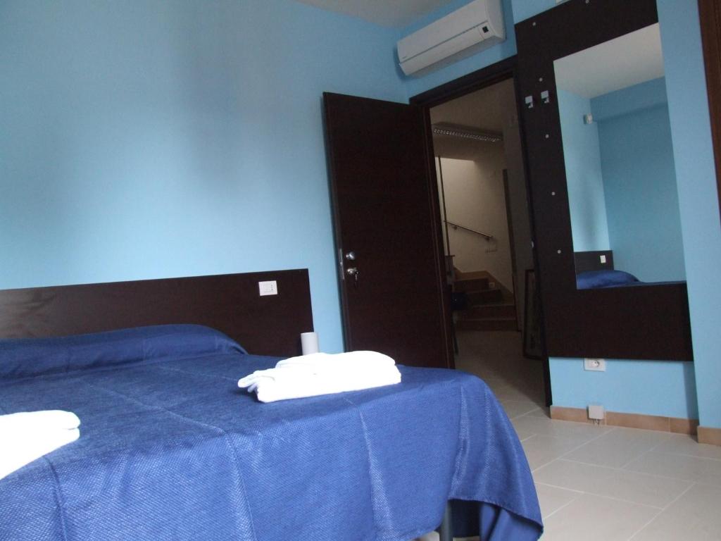 Postel nebo postele na pokoji v ubytování B&B Angolo Felice
