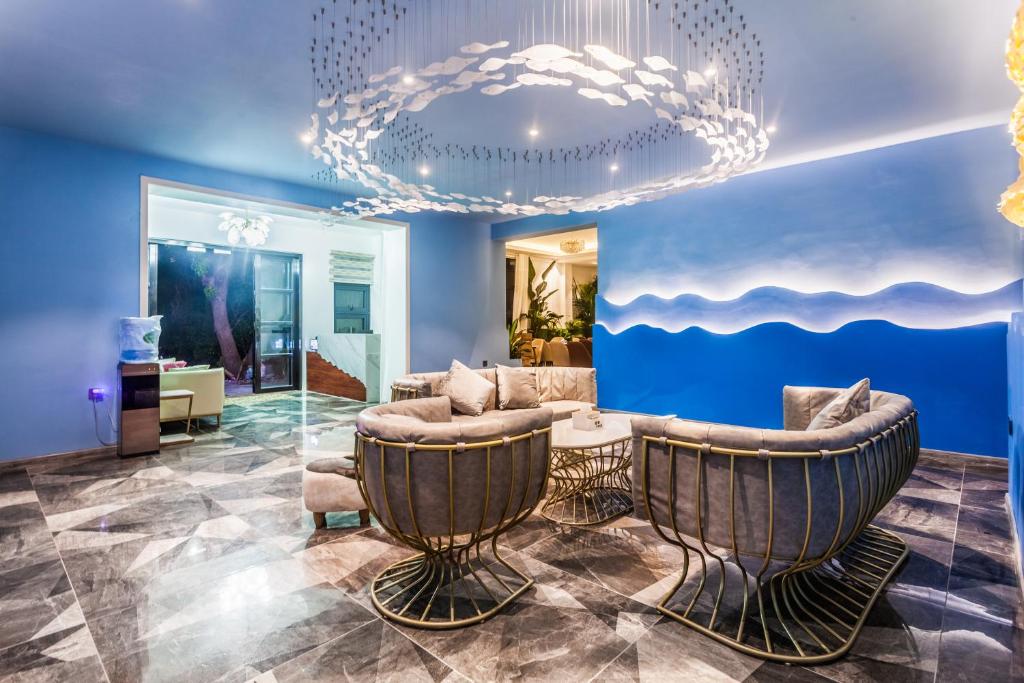 Posezení v ubytování Beihai Silver Beach Yintai Time Seaview Villa Hotel