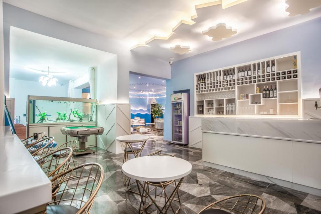 Posezení v ubytování Beihai Silver Beach Yintai Time Seaview Villa Hotel