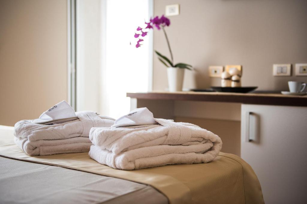 Posteľ alebo postele v izbe v ubytovaní Hotel San Martino