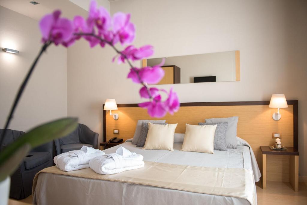 Posteľ alebo postele v izbe v ubytovaní Hotel San Martino