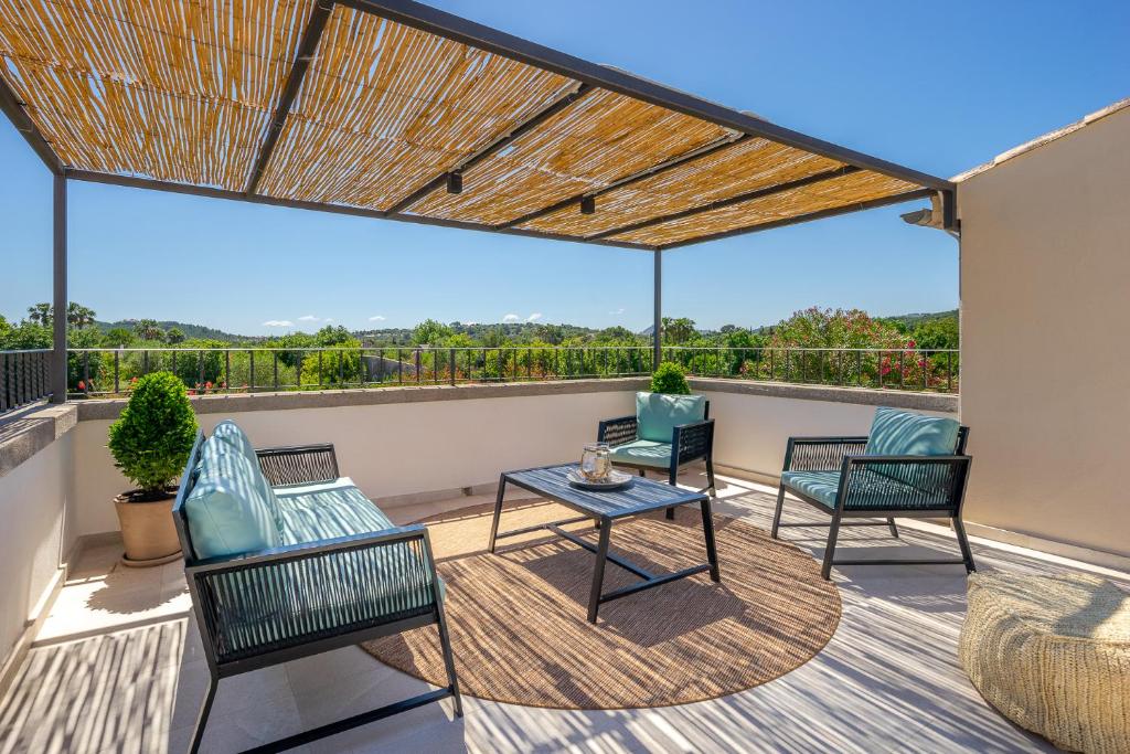 A balcony or terrace at Villa Corb Mari by Sun Villas Mallorca