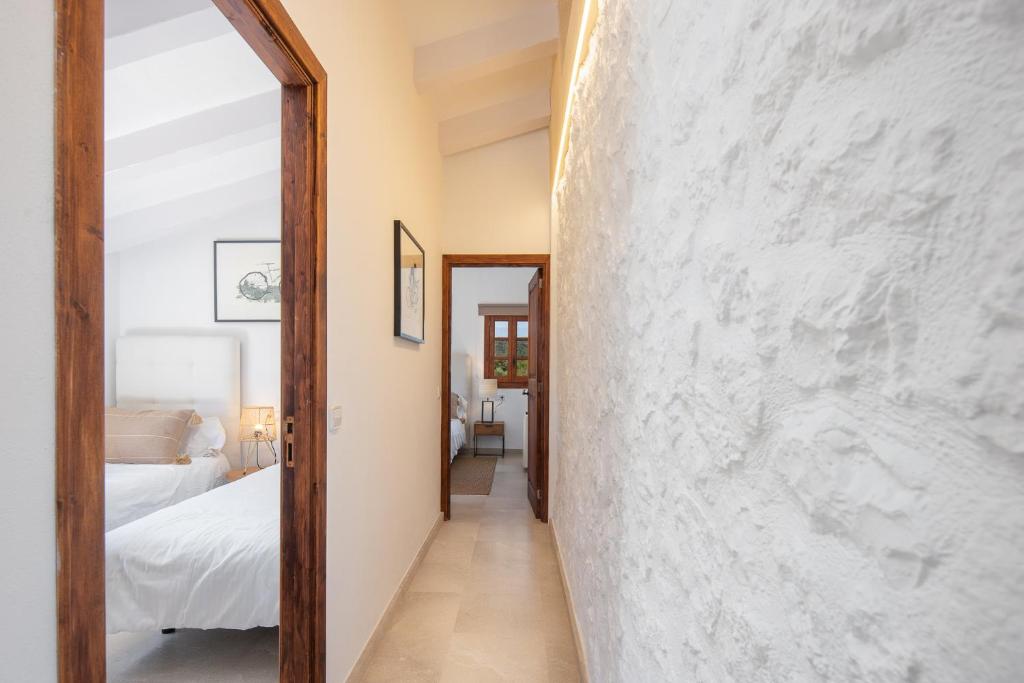 A bed or beds in a room at Villa Corb Mari by Sun Villas Mallorca