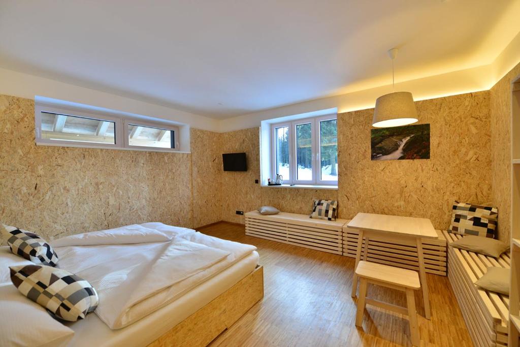 Postel nebo postele na pokoji v ubytování Montanie Resort
