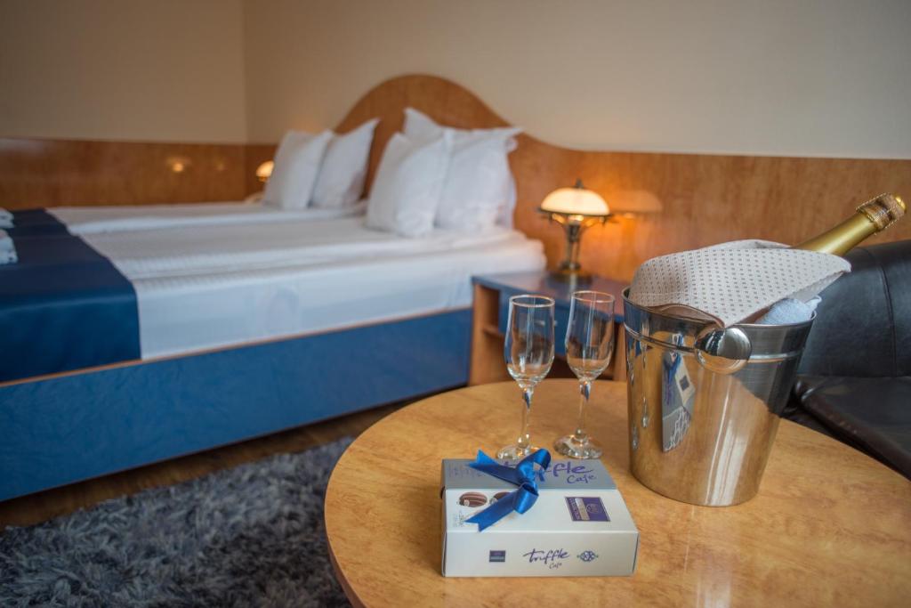 Postel nebo postele na pokoji v ubytování Hotel Marami