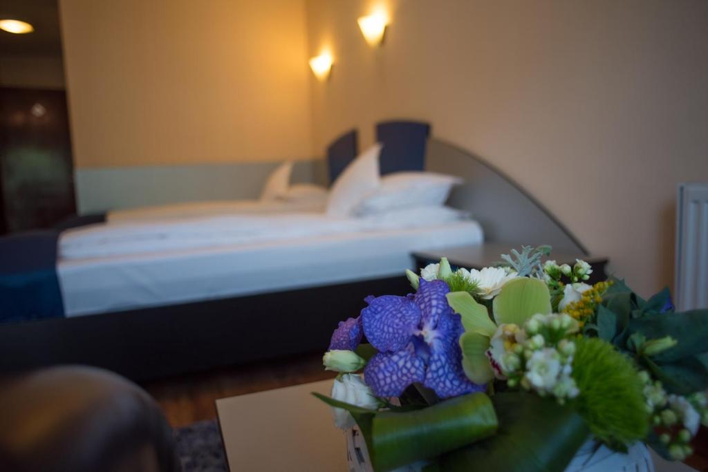 Postel nebo postele na pokoji v ubytování Hotel Marami